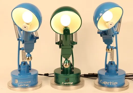 Three similar robotic lamps that can express basic human emotions, such as joy or fear.