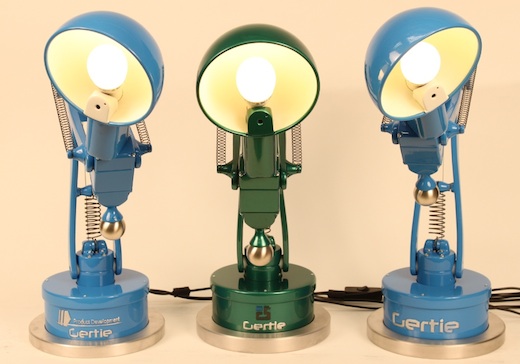 Three similar robotic lamps that can express basic human emotions, such as joy or fear. 