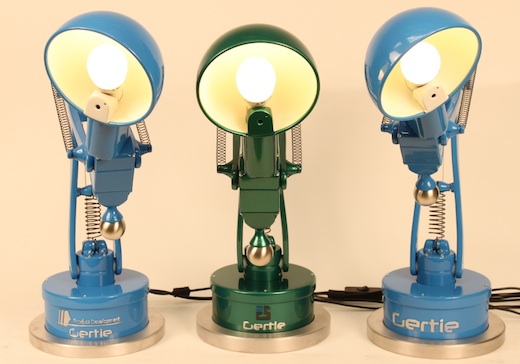 Three similar robotic lamps that can express basic human emotions, such as joy or fear.